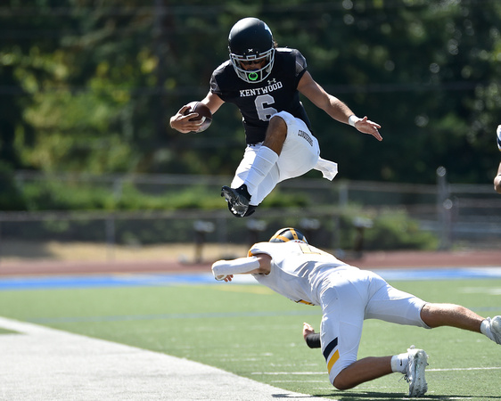 Kentwood Quarterback Hurtles Bellevue Defender - Fall 2021